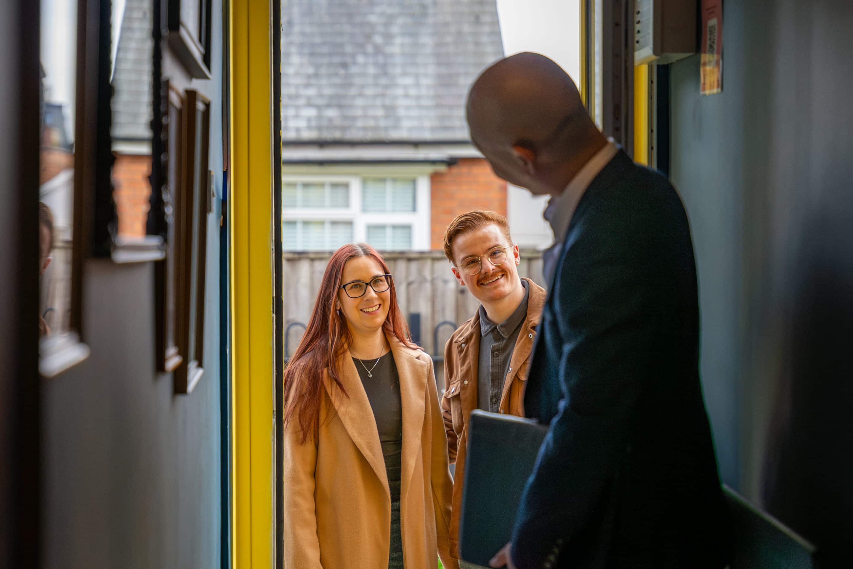 Welcome home! A couple come to view a Platinum Property Agents home